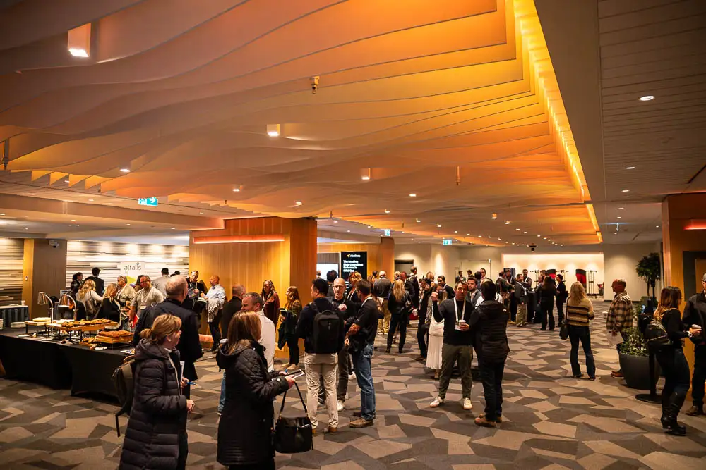 AbaData User Conference 2025 Images (11 of 20) showing a full Calgary TELUS Convention Center as attendees enjoy refreshments and time to network with other attendees