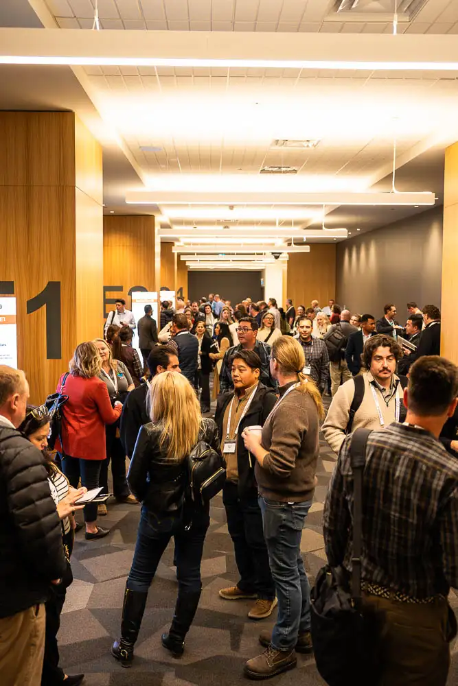 AbaData User Conference 2025 Images (14 of 20) showing crowded hallway full of attendees between technical sessions