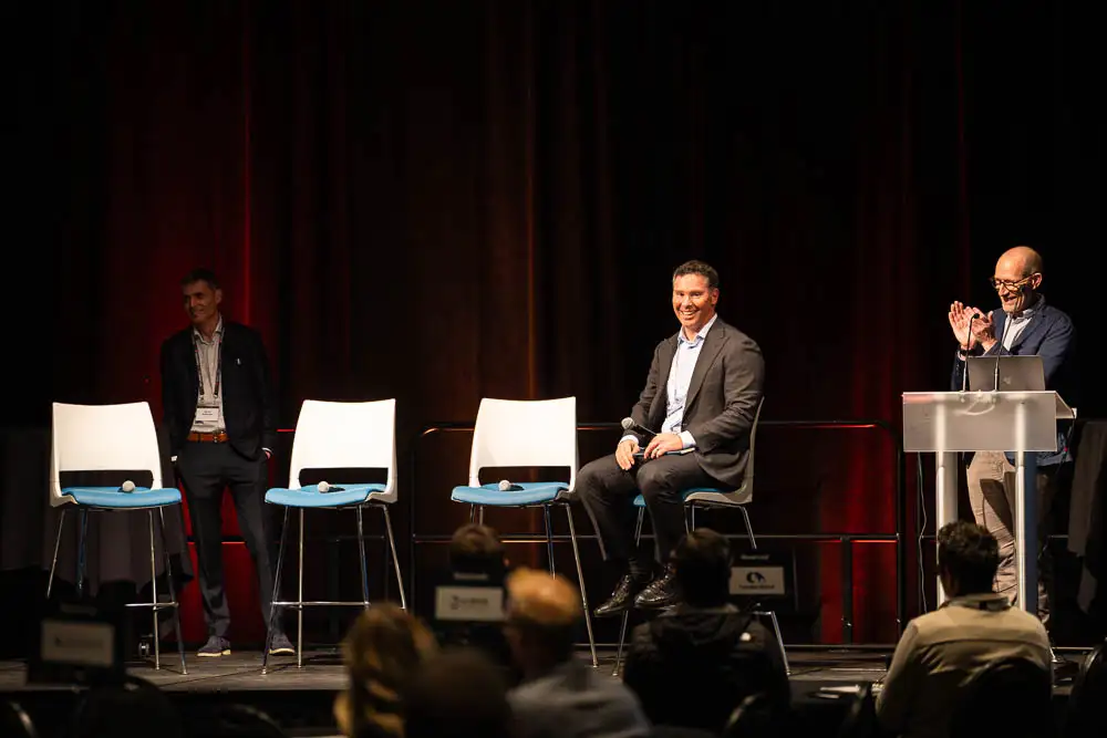 AbaData User Conference 2025 Images (19 of 20) with expert industry panelists on stage and celebratory clapping