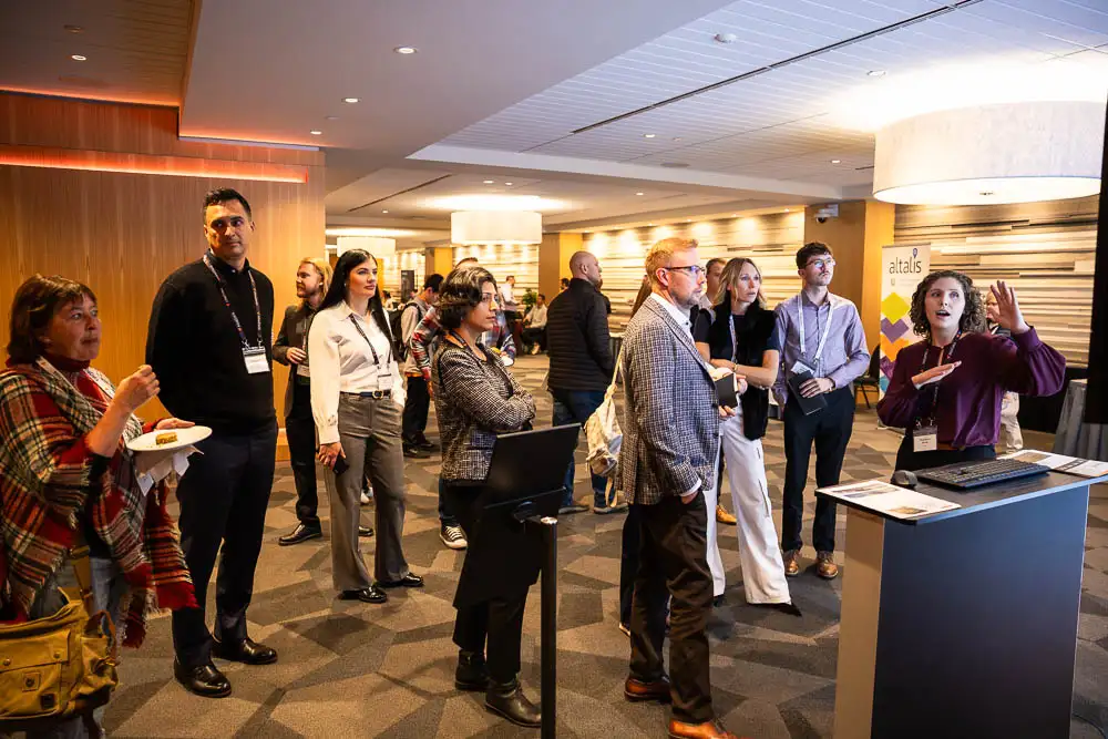 AbaData User Conference 2025 Images (9 of 20) showing a full crowd of people watching intently as AbaData support staff give a live demo of the latest AbaData software